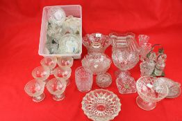 A collection of assorted vintage glassware.