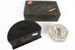 A collection of three assorted vintage boxes.