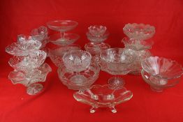 A collection of Victorian and later glass fruit bowls and punch bowls.