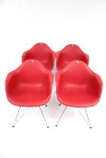 Vintage Retro : A set of four Charles & Ray Eames designed mid-century style 'DAR' red armchairs.