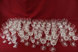 A large collection of wine drinking glasses.