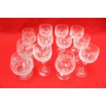A collection of cut glass drinking glasses.