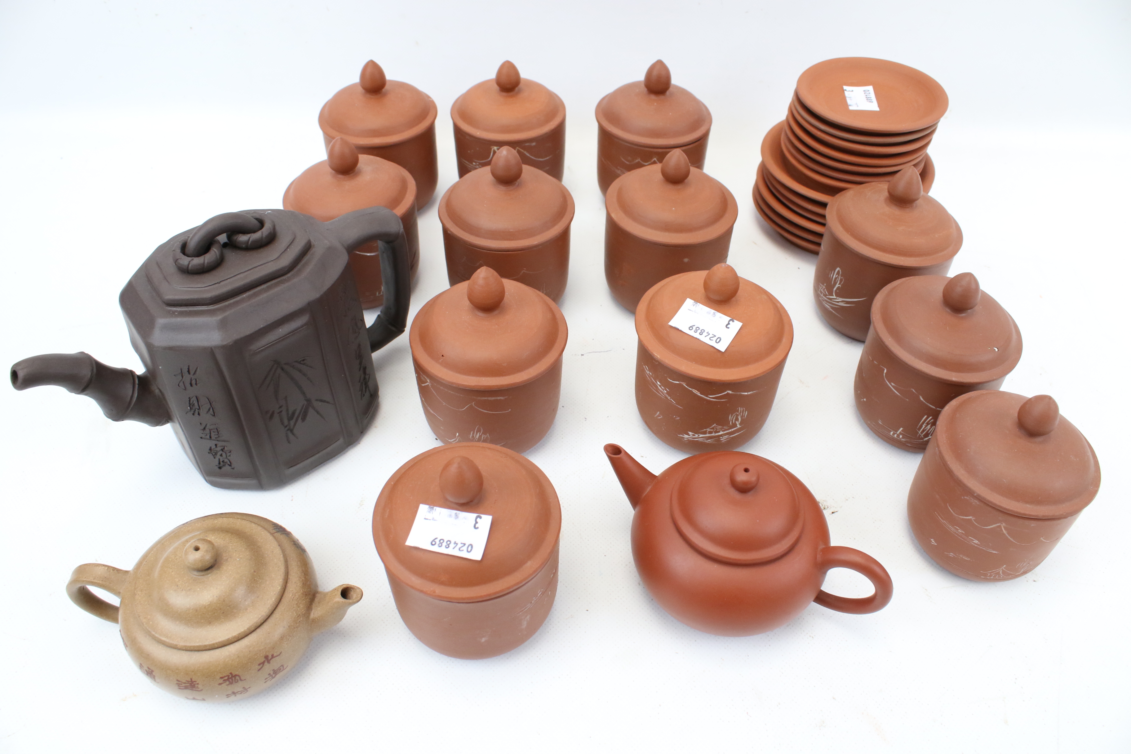 A collection of assorted modern Chinese Yixing ceramics.