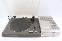 A Denon CD receiver UD-M30 and a Pioneer turntable PL-110.