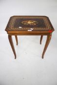 A reproduction ladies sewing table.
