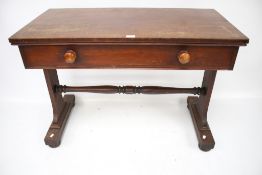 A Victorian mahogany writing table with single drawer.