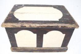 A vintage wooden trunk blanket chest.
