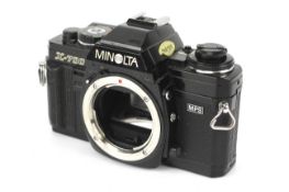 A Minolta X-700 MPS 35mm SLR camera body.