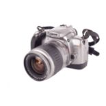 Canon EOS 300X 35mm SLR camera. Silver. With a 28-90mm f4-5.6 zoom lens, strap and case.