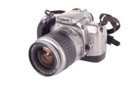 Canon EOS 300X 35mm SLR camera. Silver. With a 28-90mm f4-5.6 zoom lens, strap and case.