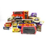 A collection of boxed diecast. Including a Budgie Routemaster, Dinky, Matchbox, etc.