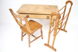Three pieces of vintage furniture. Comprising a small pine table, a child's chair and a towel rail.