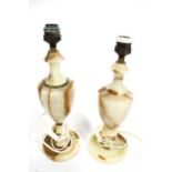 Two similar vintage onyx stone table lamp bases.