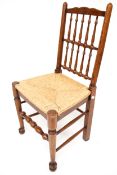 A 20th century oak framed chair.