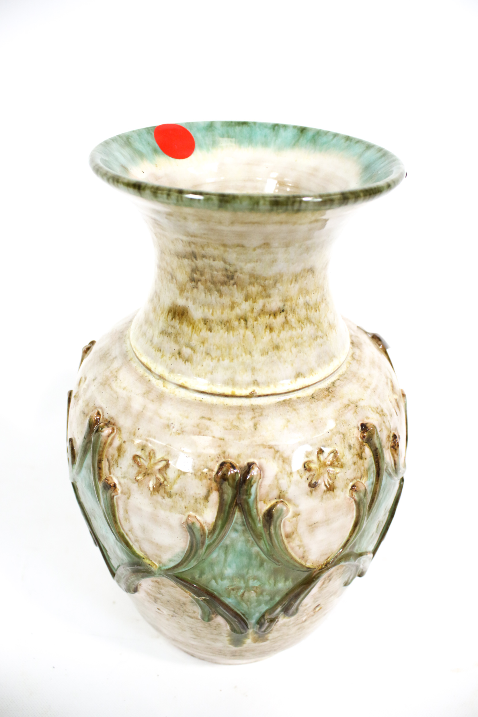 A large glazed baluster ceramic vase.