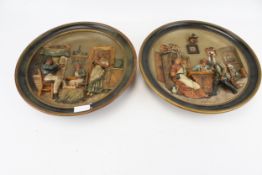 A pair of pottery plates of circular form, both featuring figures.