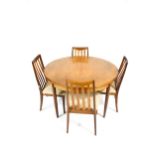 Vintage Retro : A teak circular extending dining table and four chairs.