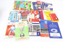 A box of ninety 20th century football programmes.