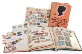 A small collection of assorted world stamps in two albums and a 1961 catalogue