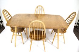 Vintage Retro : A blonde mid-century light elm Ercol extending dining table and four Windsor chairs.