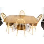 Vintage Retro : A blonde mid-century light elm Ercol extending dining table and four Windsor chairs.