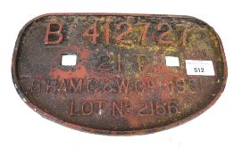 A cast iron wagon plate. Marked 'B 412727, 21T, B'HAM C&W Co 1951, Lot No.2166'. 27.5cm x 16.