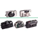 Two Canon 35mm point and shoot cameras and three obsolete APs formats.