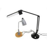 A contemporary anglepoise desk lamp and a Singer light.