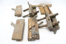 A collection of old woodworking planes.