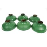 A group of six vintage Mazdalux green enamel industrial light shades.