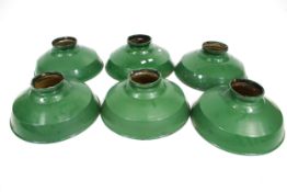 A group of six vintage Mazdalux green enamel industrial light shades.