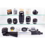 A collection of camera accessories. To include a Hoya 28mm f2.8 lens and a Hoya 135mm f2.