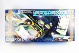 A 'Scalextric Digital Platinum' slot car racing set.