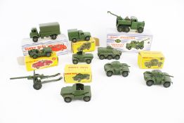 Ten Dinky diecast military vehicles.