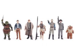 A collection of seven Star Wars figures.