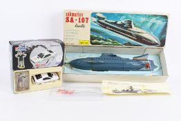 A James Bond Collections 007 Corgi Classics diecast model and a Ranetta submarine.
