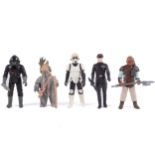 A collection of five Star Wars figures.