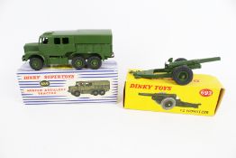 Two Dinky diecast military vehicles.