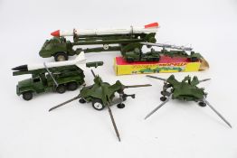 A collection of Corgi and Modelle missile trucks.