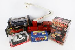 An assortment of diecast and vintage toys.