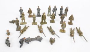 A collection of Dinky model soldiers.