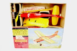 A Frog Buccaneer model plane. In red livery, complete with the original box.