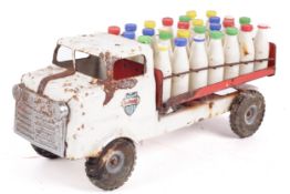 A vintage Tri-ang tinplate milk lorry.