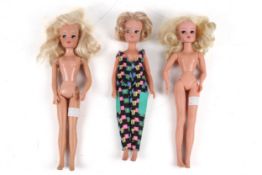 A collection of three vintage Sindy dolls.
