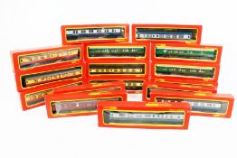 A large collection of Hornby OO gauge coaches.
