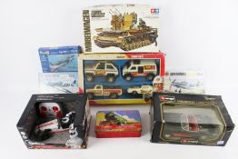 A collection of diecast models and model kits.