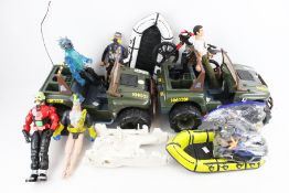 A collection of action figures, accessories and vehicles.