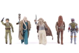 A collection of five Star Wars action figures.