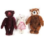 A collection of three Steiff teddy bears.