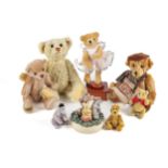 A collection of assorted teddy bears and Winnie the Pooh collectables.